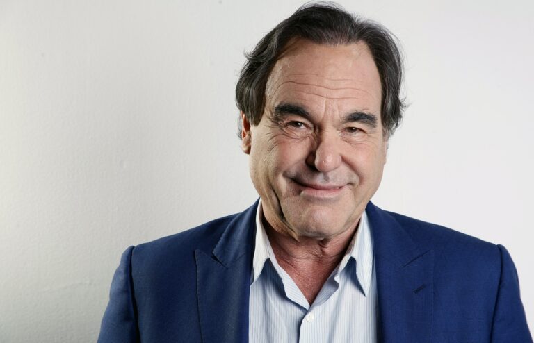 In this Wednesday, Nov. 14, 2012, photo, American film director, screenwriter and producer Oliver Stone poses for a portrait in New York. Oliver Stone has never been shy about ruffling feathers with his take real-life events. From “J.F.K” and “Nixon,” to “Salvador” and “W,” Stone has challenged the history that we know by incorporating a revisionist view. His latest project, “The Untold History of the United States,