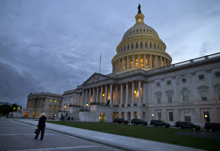This Oct. 15, 2013, photo, shows a view of the U.S. Capitol building at dusk in Washington. Even if Congress reaches a last-minute or deadline-busting deal to avert a federal default and fully reopen the government, elected officials are likely to return to their grinding brand of brinkmanship, perhaps repeatedly. House-Senate talks are barely touching the underlying causes of debt-and-spending stalemates that pushed the country close to economic crises in 2011, last December and again this month. (AP Photo/ Evan Vucci)