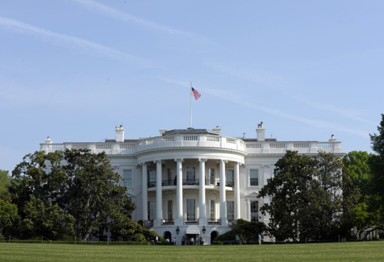 In this April 21, 2012, photo the White House, seen from the South Lawn in Washington, during a preview of the White House gardens and grounds prior to the official opening of the Garden Tours to the public. Public tours of the White House are back on the schedule, though on a limited basis, starting in November 2013. The schedule will be reduced from five days a week, to an average of three days a week, starting Nov. 5 and continuing through Jan. 15. The White House scrapped the tours earlier in 2013 after mandatory budget cuts went into effect. (AP Photo/Susan Walsh)