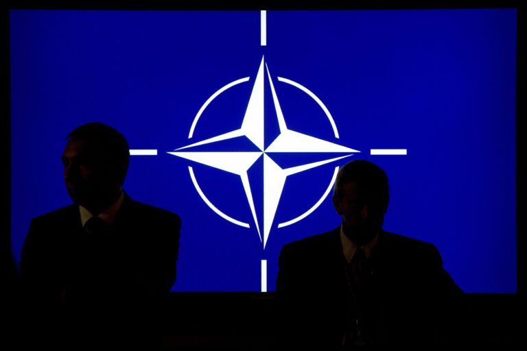 epa04384140 Participants sit in front of the Nato logo during the NATO summit in Newport, South Wales, 04 September 2014. World leaders from about 60 countries are coming together for a two-day NATO summit taking place from 04-05 September 2014. EPA/MAURIZIO GAMBARINI