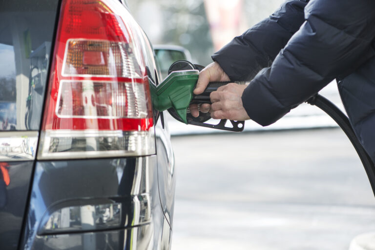A person refuels a car at a BP gas station in Kemptthal in the Canton of Zurich, Switzerland, pictured on January 19, 2015. (KEYSTONE/Christian Beutler)