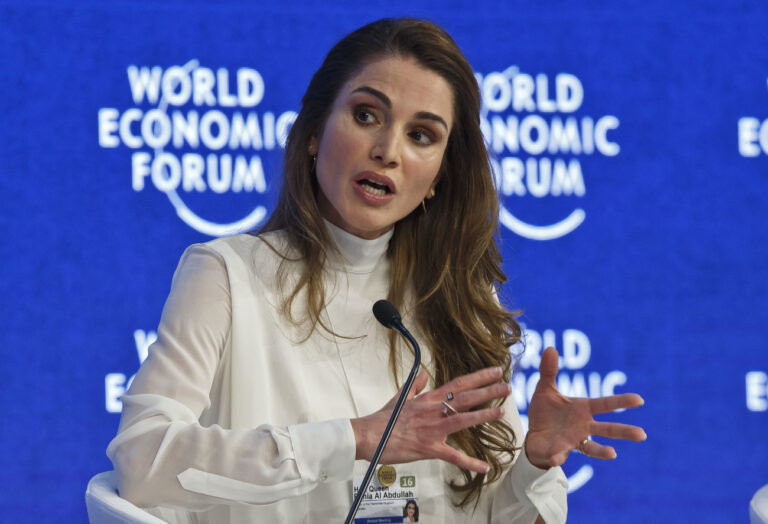 Jordan's Queen Rania gestures as she speaks during the panel 
