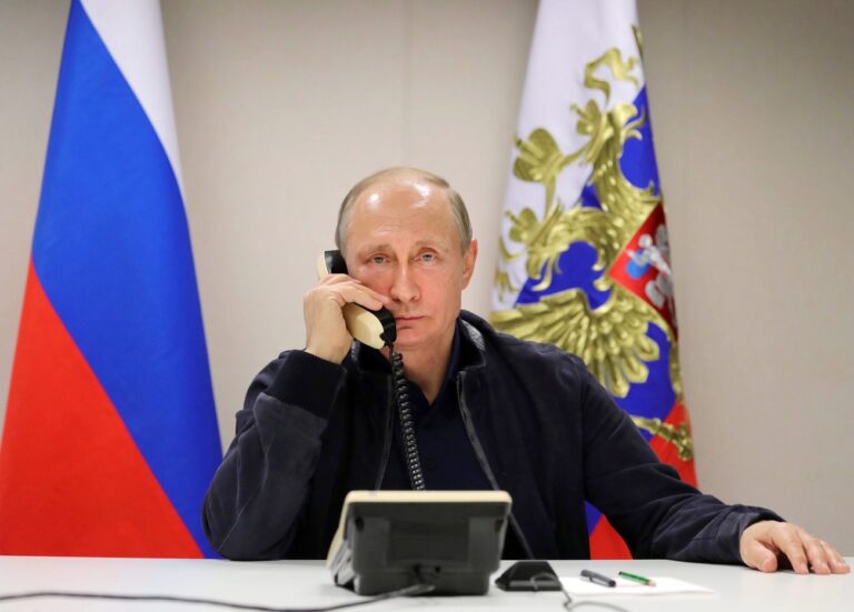 epa06045612 Russian President Vladimir Putin speaks with Turkish President Tayyip Erdogan during telephone conversation while inspecting the pipe-laying vessel Pionering Spirit in Anapa, Russia, 23 June 2017. Vladimir Putin inspected the work of laying the Turkish Stream gas pipeline in the Black Sea near Anapa. EPA/MIKHAIL METZEL/SPUTNIK/KREMLIN POOL