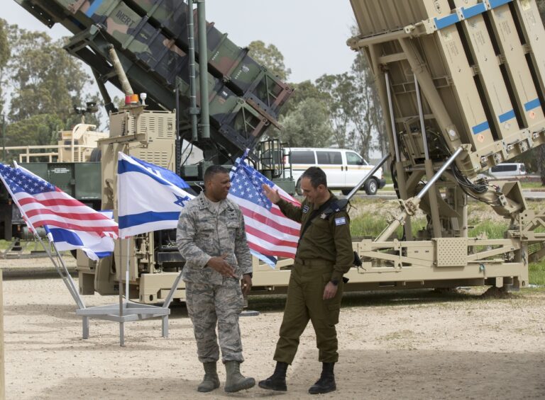 epa06589303 US Air Force Lt. Gen. Richard Clark (L), United States European Command and Israeli Brig. Gen. Zvika Haimovich (R) standing next to a Patriot missile Defense system at the Israeli Air Force Base of Hatzor, in central Israel, 08 March 2018 during a joint IDF-US military exercise 'Juniper Cobra 2018'. The ninth 'Juniper Cobra' exercise runs from 04 - 15 March 2018. Over 2,500 US troops deployed in Europe will be participating in the exercise, alongside 2,000 Israeli Aerial Defense troops. The exercise simulates a scenario in which US forces would deploy to Israel in order to aid the IDF Aerial Defense forces, The simulations will include the use of the 'Arrow,' 'Iron Dome', 'Patriot', and 'David's Sling' Systems, that were declared operational in April 2017. EPA/ATEF SAFADI