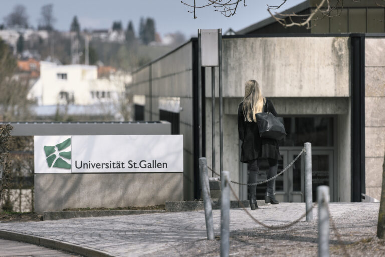 A woman pictured outside the University of St. Gallen HSG in St. Gallen, Switzerland, on March 27, 2018. (KEYSTONE/Christian Beutler)