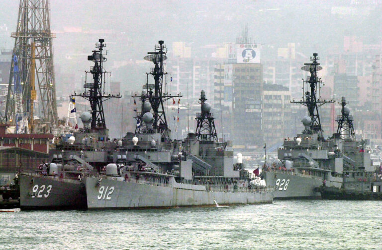 After maneuvers in the Taiwan Strait, Taiwan Navy's U.S.-made Gearing Class frigates dock Wednesday, May 2, 2001, in Keelung harbor, 35 kilometers (21 miles) east of Taipei. Tensions remain high between the U.S. and Beijing after last week's decision by the U.S. to sell advanced weapons to Taiwan in the annual arms talks. (AP Photo/Wally Santana)