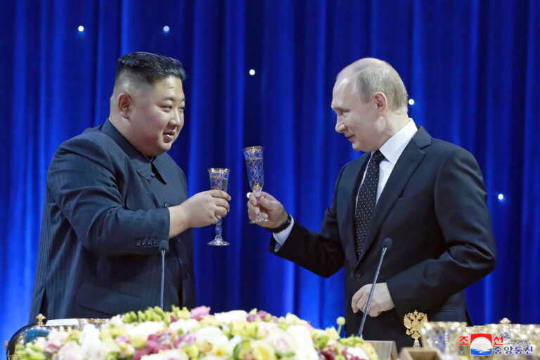 epa07528535 A photo released by the official North Korean Central News Agency (KCNA) shows North Korean leader Kim Jong-un (L) and Russian President Vladimir Putin (R) raising their glasses for a toast during a grand banquet after Russian - North Korean talks at the Far Eastern Federal University campus on the Russky Island in Vladivostok, Russia, 25 April 2019 EPA/KCNA EDITORIAL USE ONLY