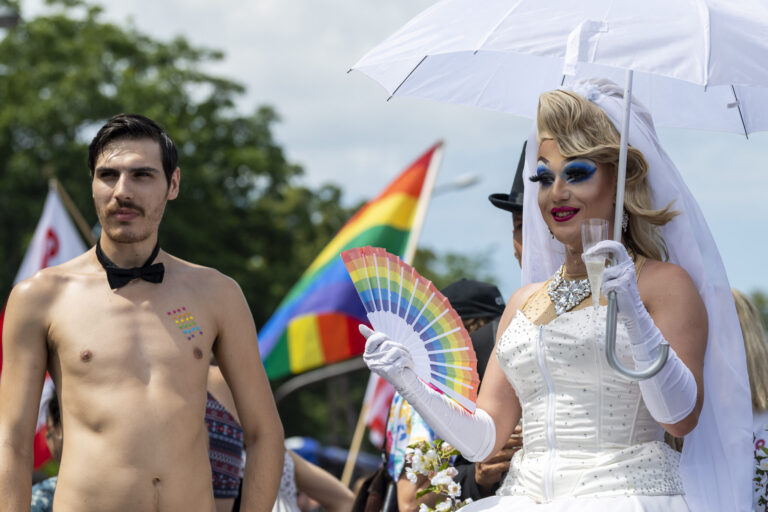 People participate in the Pride March LGBTQ + Pride (Lesbian, Gay, Bi, Trans and more), in Geneva, Switzerland, Saturday, July 06, 2019. (KEYSTONE/Martial Trezzini)