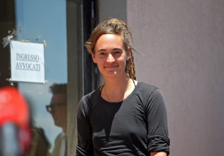 epa07724607 Sea-Watch3 captain Carola Rackete leaves the Court after being questioned by prosecutors, in Agrigento, Sicily island, southern Italy, 18 July 2019. Prosecutors in the Sicilian city of Agrigento on 17 July filed an appeal to the supreme Court of Cassation against a judge's decision not to keep Sea-Watch3 captain Carola Rackete under house arrest. The 31-year-old woman from Germany on 29 June allegedly hit a finance police vessel as she defied a ban in order to land 40 migrants on the island of Lampedusa, saying she was afraid some might commit suicide after being at sea for 17 days following a rescue off Libya. EPA/PASQUALE CLAUDIO MONTANA LAMPO