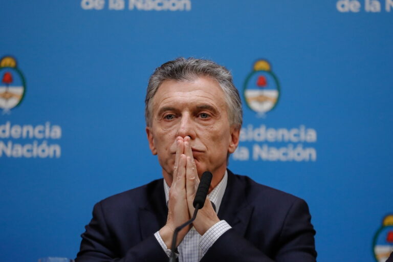 epa07770486 The President of Argentina, Mauricio Macri, takes part in a press conference one day after finishing second in the first round of the presidential election, in the 'Casa Rosada' Government House, in Buenos Aires, Argentina, 12 August 2019. Macri said he is planning an electoral comeback for the second round in October and he announced economic measures against the strong devaluation of the Argentine Peso one day after the vote. EPA/Juan Ignacio Roncoroni