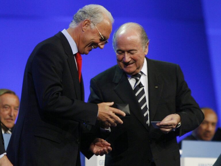 German soccer legend Franz Beckenbauer, left, receives a medal from FIFA President Joseph Blatter as he becomes a member of the executive committee of the FIFA during the 57th FIFA congress in Zurich, Switzerland, on Thursday, May 31, 2007. (KEYSTONE/Steffen Schmidt)
