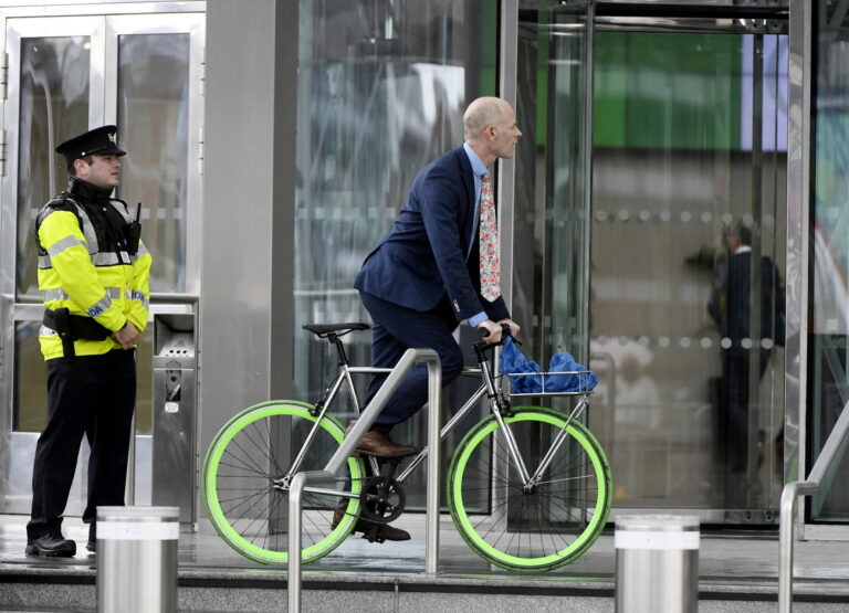 epa08511579 Ireland's Green Party MP Ossian Smyth arrives at the Convention Centre in Dublin, Ireland, 27 June 2020. Due to social distancing measures, the Irish Parliament is sitting in the convention centre to officially elect new Prime Minister Micheal Martin from the Fianna Fail Party who are forming a historic coalition with Fine Gael led by Leo Varadker and the Green Party. EPA/Aidan Crawley