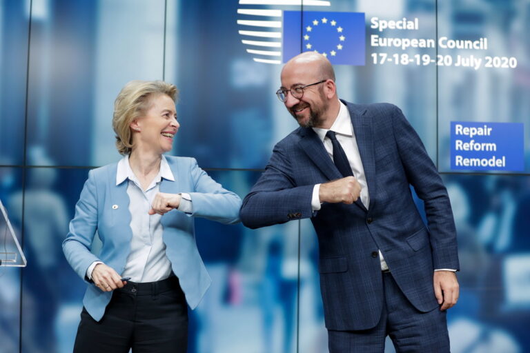 epa08557681 European Commission President Ursula Von Der Leyen (L) and European Council President Charles Michel (R) give a elbow shot at the end of a news conference following a four day European summit at the European Council in Brussels, Belgium, 21 July 2020. European Union nations leaders meet face-to-face for a fourth day to discuss plans to respond to the coronavirus pandemic and a new long-term EU budget. EPA/STEPHANIE LECOCQ / POOL