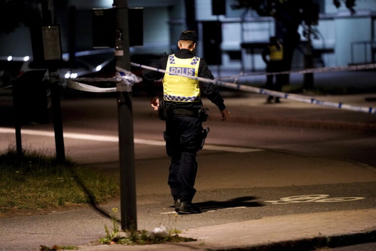 epa09314777 Police at the scene where a fellow police officer was shoot dead during a shooting in Gothenburg, Sweden, 01 July 2021. EPA/Bjorn Larsson Rosvall SWEDEN OUT