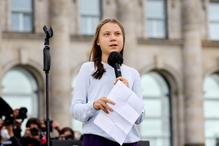 epa09485508 Swedish climate activist Greta Thunberg delivers a speech at the Fridays For Future global climate action day in Berlin, Germany, 24 September 2021. Climate activists of Fridays For Future call for socially fair and consistent measures to limit climate heating to 1.5 degrees Celsius ahead of German federal elections, that take place on 26 September 2021. The young activists are planning hundreds of protests and demonstrations worldwide during a 'climate strike' on 24 September 2021. EPA/FILIP SINGER