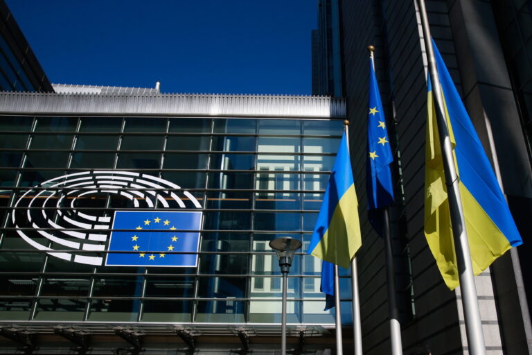 epa09791590 Ukrainian flags are hoisted along the Flag of Europe to show solidarity with Ukraine over the Russian aggression, in front of the European Parliament in Brussels, Belgium, 28 February 2022. EU defense ministers are meeting via video conference on 28 February to discuss the latest situation on the ground in Ukraine, following Russia's military invasion. EPA/STEPHANIE LECOCQ