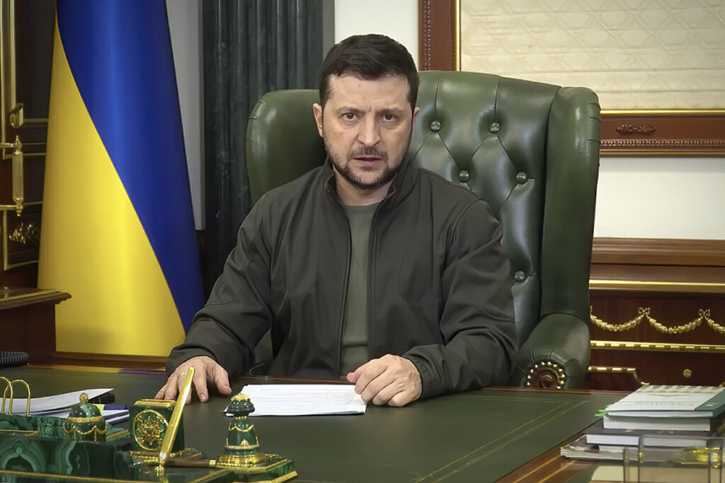 In this image from video provided by the Ukrainian Presidential Press Office and posted on Facebook early March 18, 2022, Ukrainian President Volodymyr Zelenskyy speaks from Kyiv, Ukraine. (Ukrainian Presidential Press Office via AP)