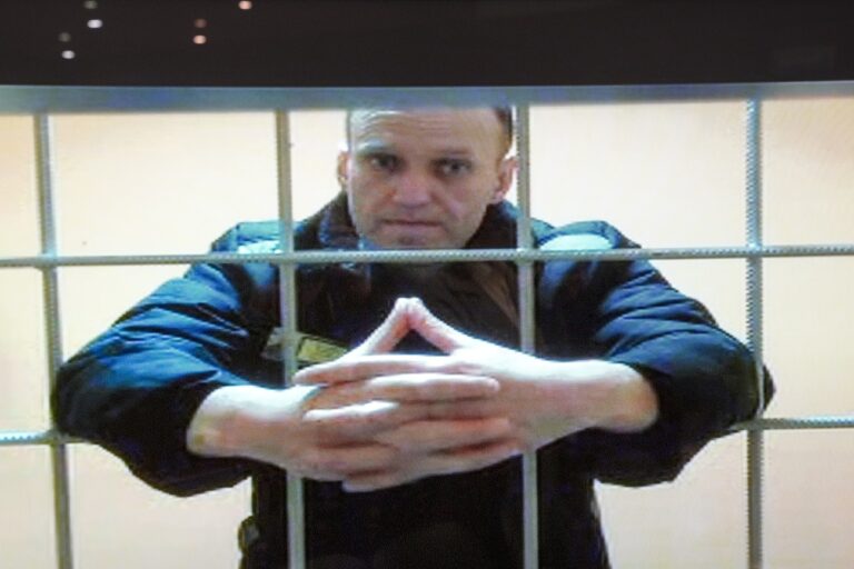In this image provided by the Russian Federal Penitentiary Service, opposition leader Alexei Navalny appears on a video screen set up at Moscow City Court, Tuesday, May 24, 2022. The court on Tuesday rejected NavalnyâÄ™s appeal of a nine-year prison sentence for fraud. (Russian Federal Penitentiary Service via AP)