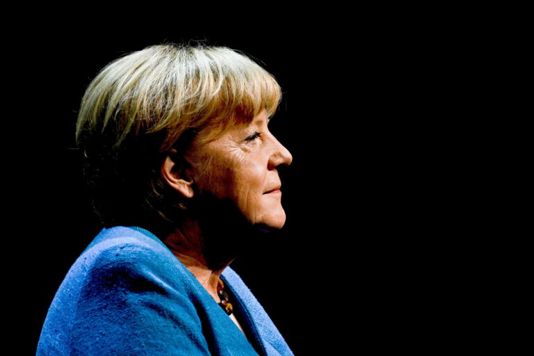 epa10000934 Former German Chancellor Angela Merkel during 'So what is my country?' conversation with Alexander Osang at the Berliner Ensemble in Berlin, Germany, 07 June 2022. EPA/FILIP SINGER