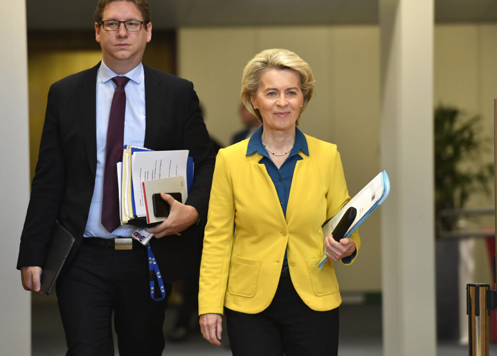 European Commission President Ursula von der Leyen, right, arrives for a meeting of the College of Commissioners at EU headquarters in Brussels, Friday, June 17, 2022. Ukraine's request to join the European Union may advance Friday with a recommendation from the EU's executive arm that the war-torn country deserves to become a candidate for membership in the 27-nation bloc. (AP Photo/Geert Vanden Wijngaert)