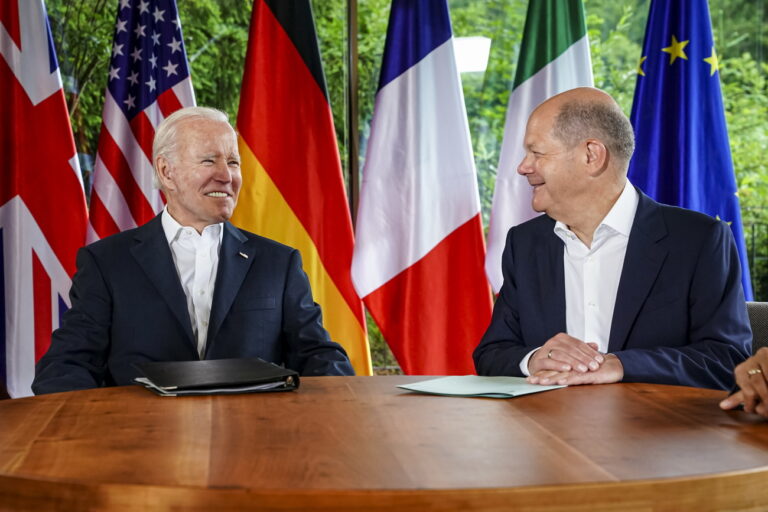 epa10037842 US President Joe Biden (L) and German Chancellor Olaf Scholz (R) chat before meeting with other G7 leaders at Elmau Castle in Kruen, Germany, 28 June 2022. Germany is hosting the G7 summit at Elmau Castle near Garmisch-Partenkirchen from 26 to 28 June 2022. EPA/CLEMENS BILAN / POOL