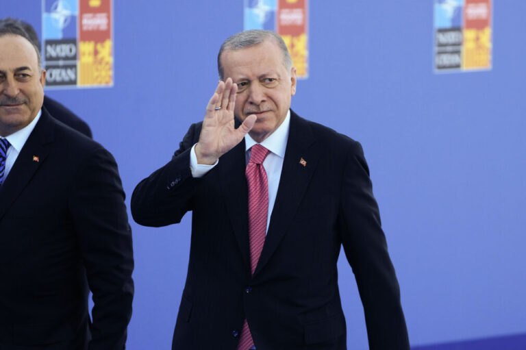 Turkish President Recep Tayyip Erdogan, right, and Turkish Foreign Minister Mevlut Cavusoglu, left, arrive for the NATO summit in Madrid, Spain on Wednesday, June 29, 2022. North Atlantic Treaty Organization heads of state will meet for a NATO summit in Madrid from Tuesday through Thursday. (AP Photo/Paul White)