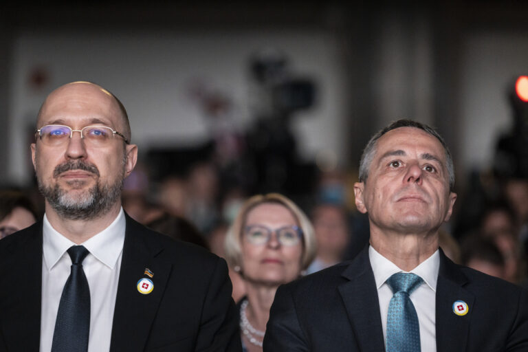 Swiss President Ignazio Cassis, Minister of Foreign Affairs, right, and Ukrainian Prime Minister Denys Shmyhal, right, with Swiss Secetary of State Livia Leu, center, participate in the closing plenary during the Ukraine Recovery Conference URC, Tuesday, July 5, 2022 in Lugano, Switzerland. The URC is organised to initiate the political process for the recovery of Ukraine after the attack of Russia to its territory. (KEYSTONE/EDA/Alessandro della Valle)