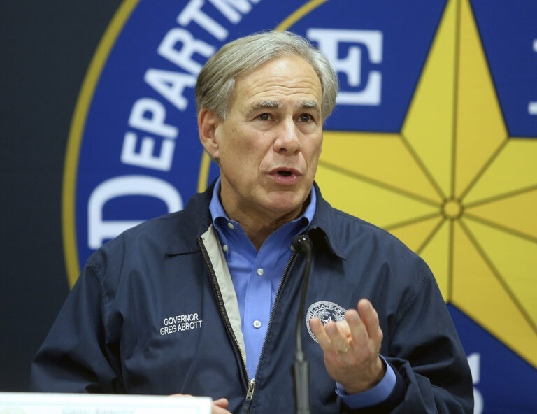 FILE - Texas Gov. Greg Abbott speaks during a news conference on March 10, 2022, in Weslaco, Texas. The U.S. Department of Justice is investigating potential civil rights violations in Texas' multibillion-dollar border security mission that has given the National Guard arrest powers and seen state authorities bus migrants to Washington, D.C., according to public records. (Joel Martinez/The Monitor via AP, File)