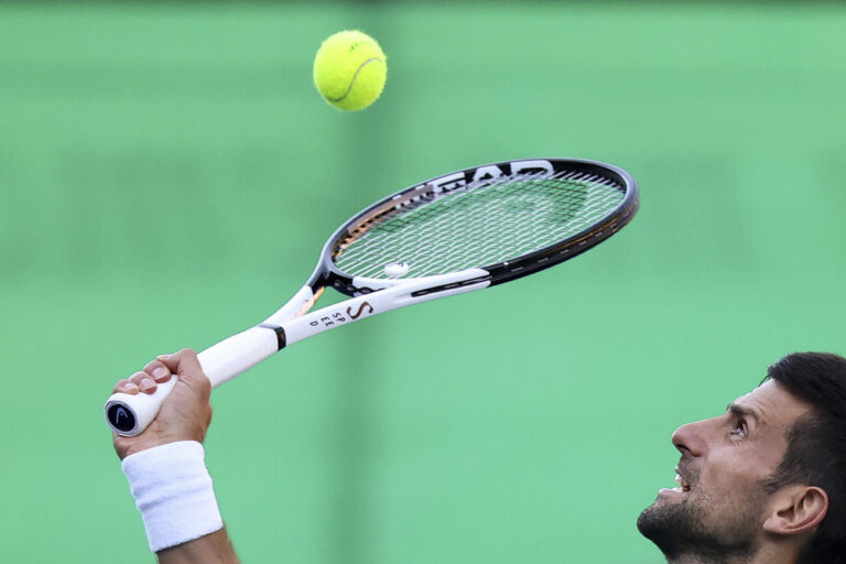 Serbia's Novak Djokovic in action while playing an exhibition match against Croatia's Ivan Dodig in Visoko, Bosnia, Wednesday, July 13, 2022. (AP Photo/Armin Durgut)