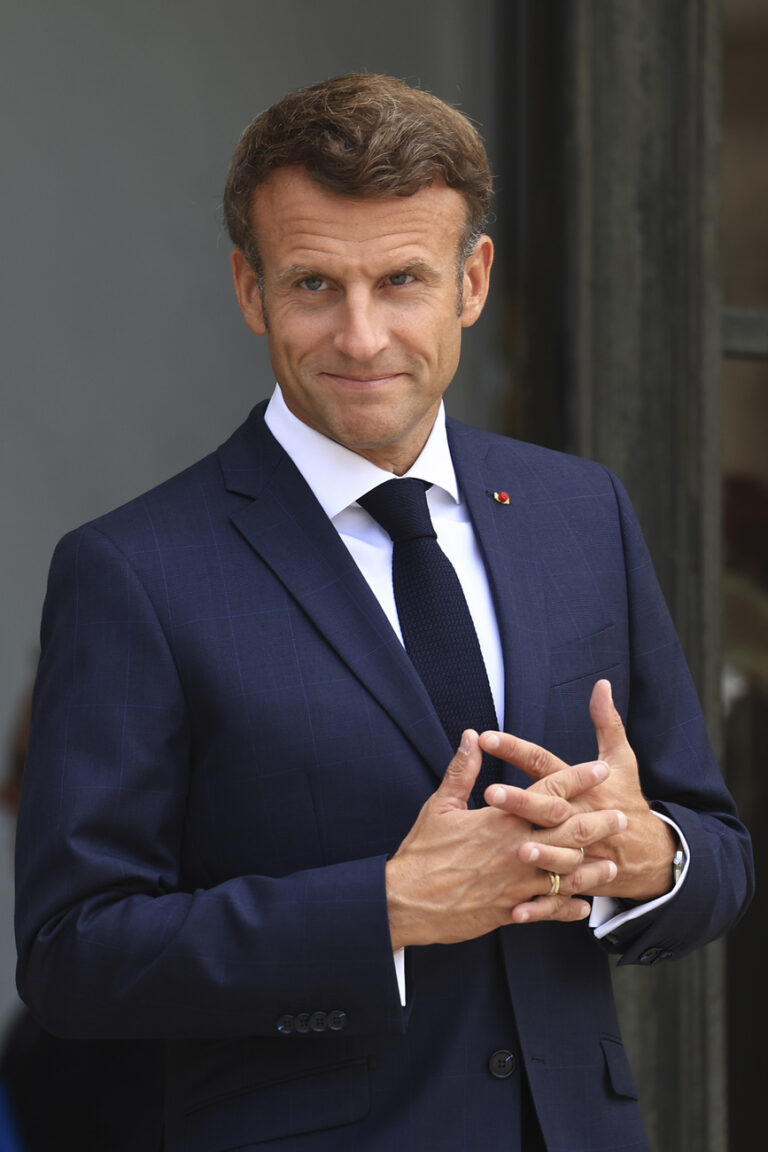 French President Emmanuel Macron waits for Slovenia's Prime Minister Robert Golob prior to their talks Thursday, Sept. 1, 2022 at the Elysee Palace in Paris. (AP Photo/Aurelien Morissard)