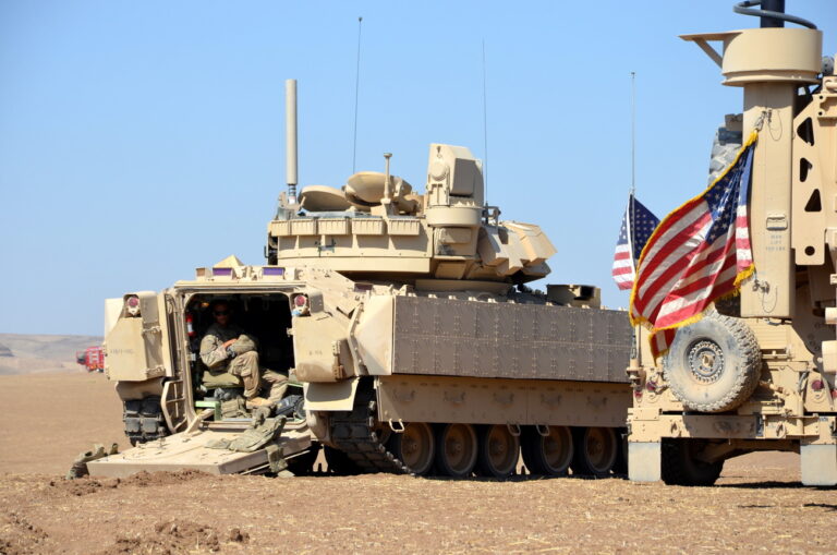 epa10167529 US armored trucks take up position during Military exercises with Syria democratic forces (SDF) at Dayrik town close to the tri-border between Syria, Iraq, and Turkey in al-Hasakah governorate, northeastern Syria, 07 September 2022. The US-led coalition carried out the first joint military exercise with the Syrian Democratic Forces (SDF) in the border village of Taqil Baqil in Derik district near the tri-border between Syria, Iraq, and Turkey. The SDF said that the maneuver aims to raise the readiness of the SDF and make it ready to repel possible attacks that launched by ISIS cells in the region. EPA/AHMED MARDNLI