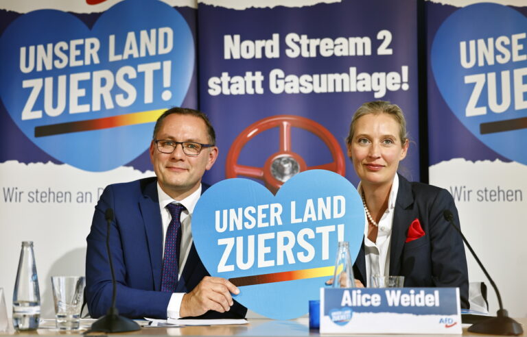 epa10169746 Alternative for Germany (AfD) right-wing political party co-chairman Tino Chrupalla (L) and deputy chairwoman Alice Weidel attend a news conference to present the new party campaign 'Unser Land zuerst!' (Our Country First!) campaign in Berlin, Germany, 08 September 2022. EPA/HANNIBAL HANSCHKE