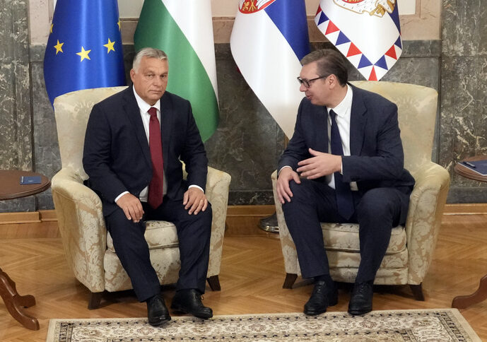 Hungary's Prime Minister Viktor Orban, left, speaks with Serbian President Aleksandar Vucic in Belgrade, Serbia, Friday, Sept. 16, 2022. Orban is on a one day working visit to Serbia. (AP Photo/Darko Vojinovic)