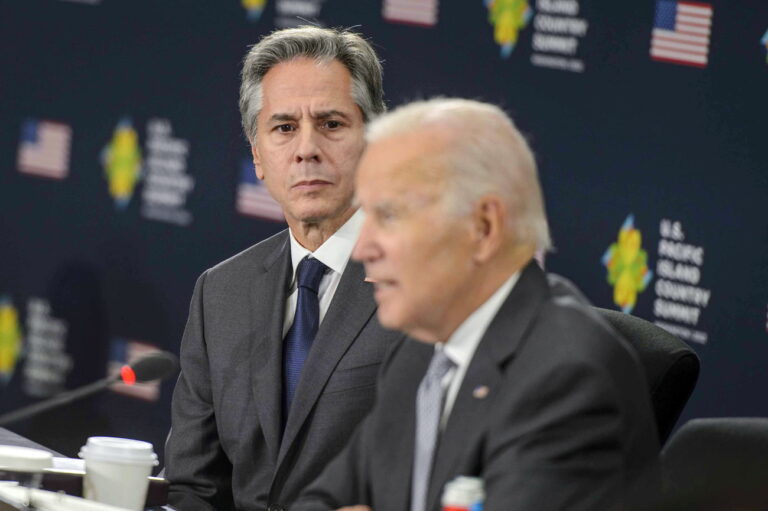 epa10214382 US Secretary of State Antony Blinken (L) looks on as US President Joe Biden (R) speaks during the first US, Pacific Island Country Summit with leaders from over 10 countries at the State Department, in Washington, DC, USA, 29 September 2022. EPA/BONNIE CASH / POOL