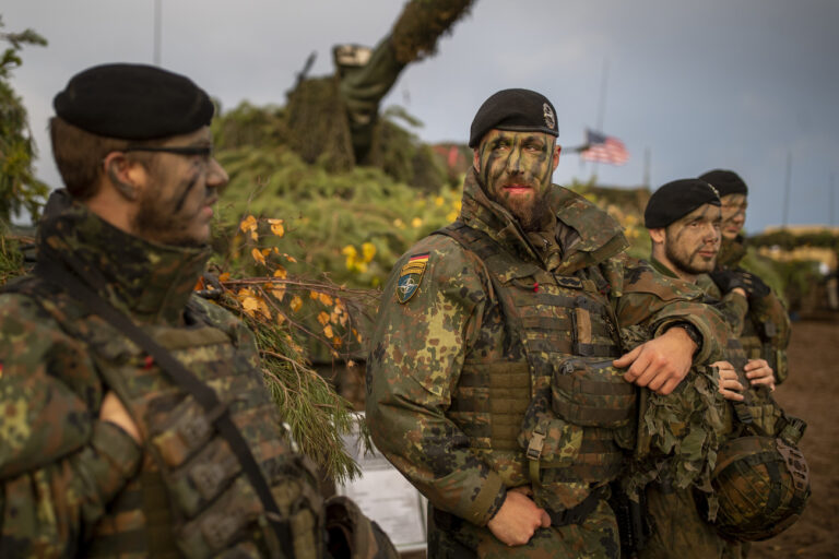 German Bundeswehr soldiers take part in the NATO military exercise 'Iron Wolf 2022-II' at a training range in Pabrade, north of the capital Vilnius, Lithuania on Wednesday, Oct. 26, 2022. The multinational exercise 'Iron Wolf 2022-II' will train roughly 3,500 soldiers. (AP Photo/Mindaugas Kulbis)