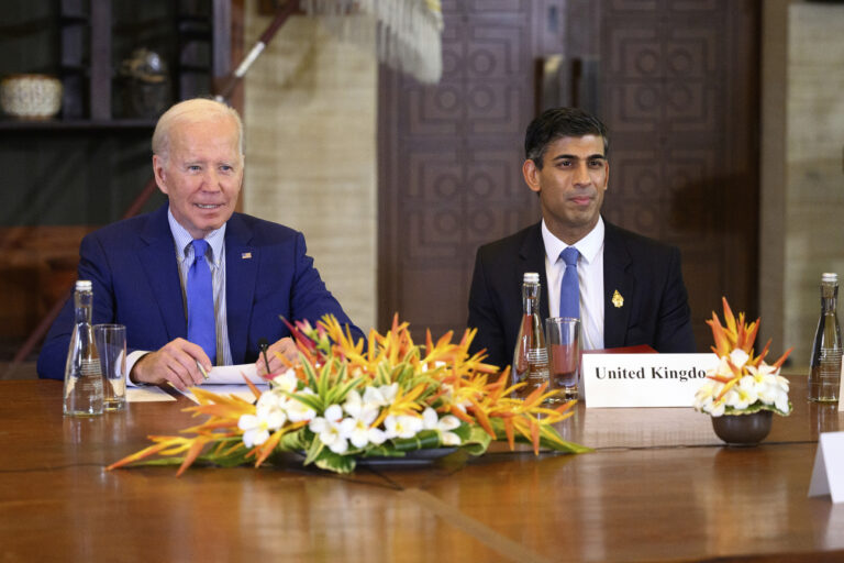 U.S. President Joe Biden, left, and British Prime Minister Rishi Sunak attend an emergency meeting of leaders at the G20 summit following the overnight missile strike by a Russian-made rocket on Poland, Wednesday, Nov. 16, 2022, in Nusa Dua, Bali, Indonesia. (Leon Neal/Pool Photo via AP)