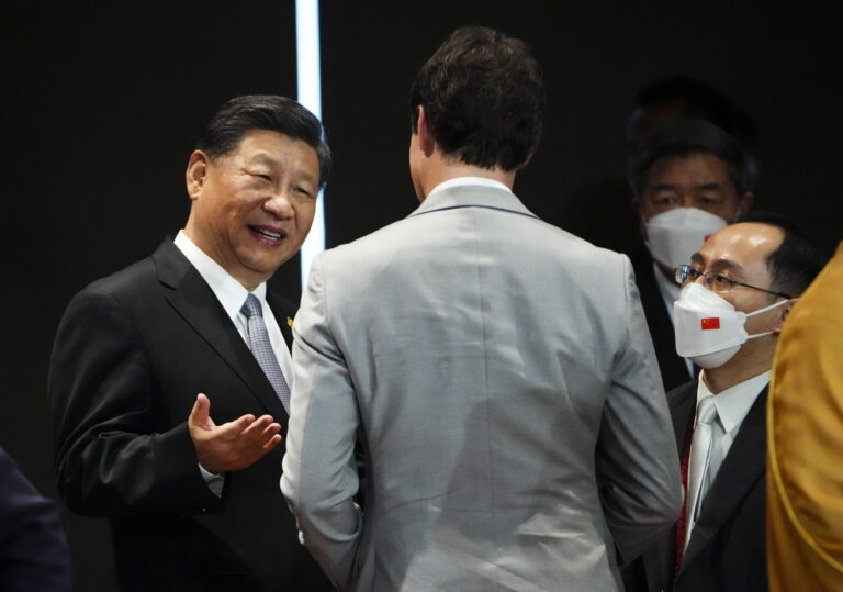Canada Prime Minister Justin Trudeau talks with Chinese President Xi Jinping after taking part in the closing session at the G20 Leaders Summit in Bali, Indonesia on Wednesday, Nov. 16, 2022. Xi Jinping chastised Trudeau at the G-20 summit for leaking details of a prior meeting between them. The complaint came during a brief conversation on the sidelines of an event in Indonesia that news outlets were able to record. (Sean Kilpatrick/The Canadian Press via AP)
