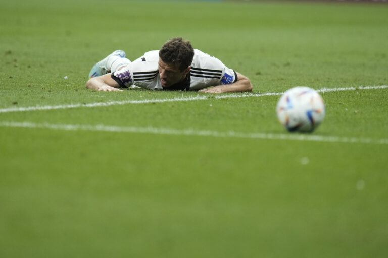 Germany's Thomas Mueller lies on the ground during the World Cup group E soccer match between Costa Rica and Germany at the Al Bayt Stadium in Al Khor , Qatar, Thursday, Dec. 1, 2022. (AP Photo/Hassan Ammar)