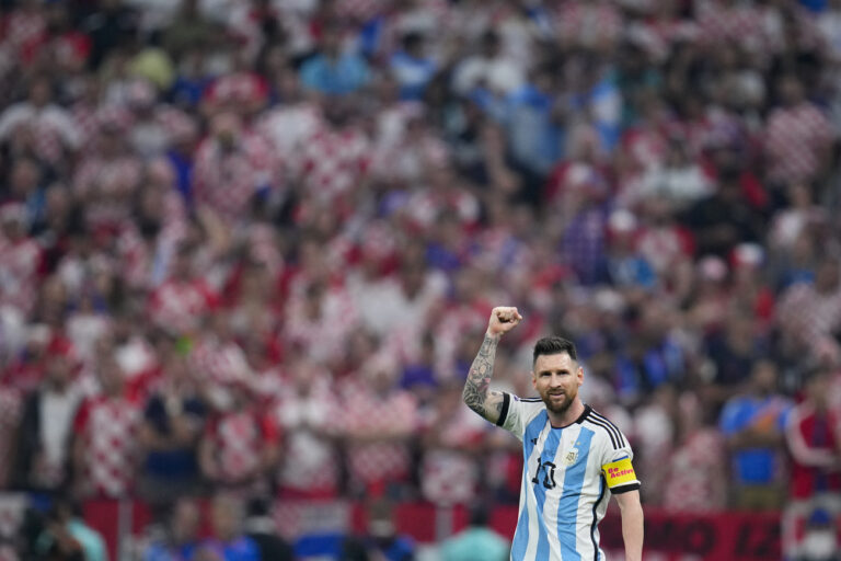 Argentina's Lionel Messi celebrates after scoring from the penalty spot the opening goal during the World Cup semifinal soccer match between Argentina and Croatia at the Lusail Stadium in Lusail, Qatar, Tuesday, Dec. 13, 2022. (AP Photo/Natacha Pisarenko)