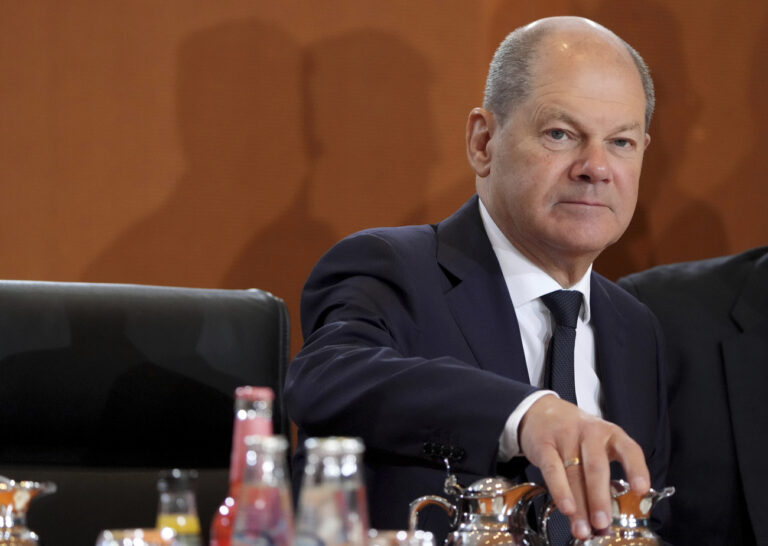 Chancellor Olaf Scholz arrives for the weekly cabinet meeting at the Chancellery in Berlin, Germany, Wednesday, Jan. 18, 2023. (AP Photo/Michael Sohn)