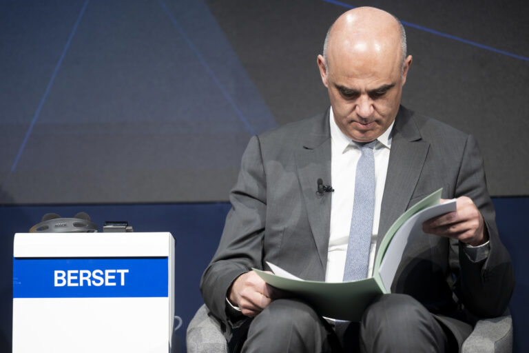 Switzerland's President Alain Berset, reads his documents prior to a session during the 53rd annual meeting of the World Economic Forum, WEF, in Davos, Switzerland, Thursday, January 19, 2023. The meeting brings together entrepreneurs, scientists, corporate and political leaders in Davos under the topic 
