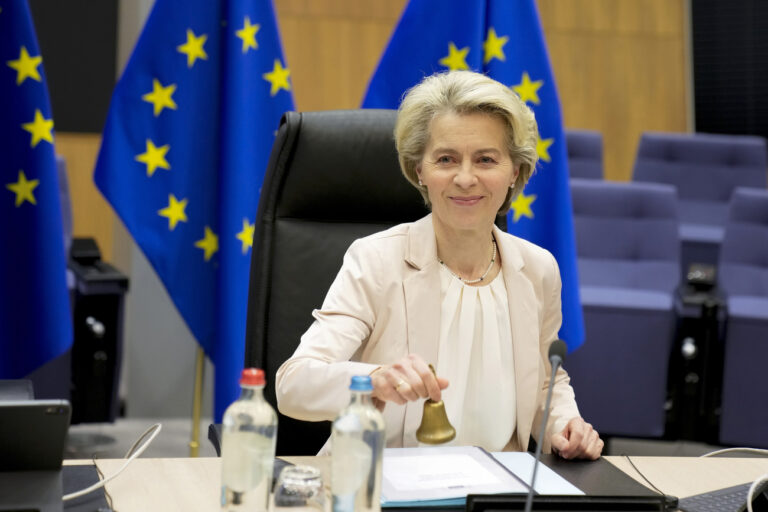 European Commission President Ursula von der Leyen rings a bell to signify the start of the weekly college of commissioners meeting at EU headquarters in Brussels on Wednesday, Jan. 25, 2023. (AP Photo/Virginia Mayo)