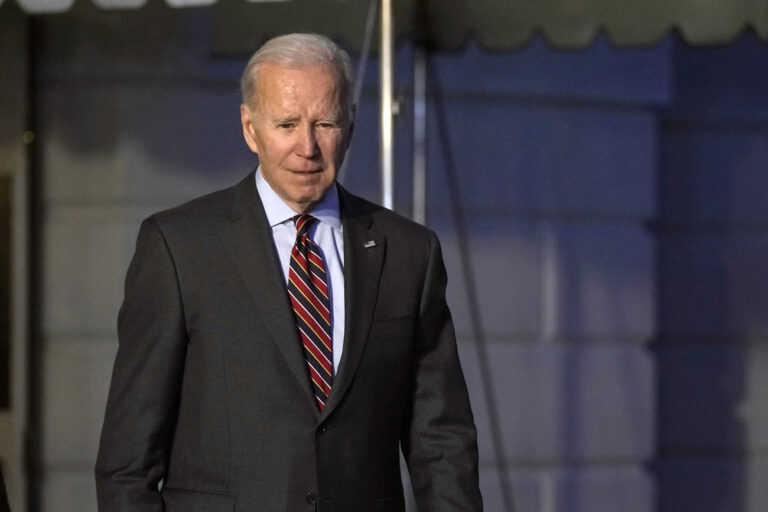 President Joe Biden walks out of the White House in Washington to speak with reporters before heading towards Marine One on the South Lawn of the White House in Washington, Friday, Jan. 27, 2023. Biden is heading to Camp David for the weekend. (AP Photo/Susan Walsh)
