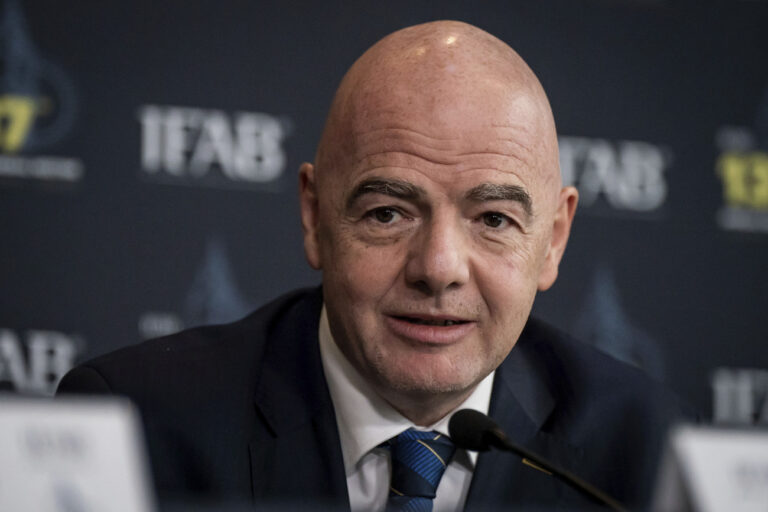 FIFA President Gianni Infantino speaks during the 137th IFAB AGM at Marriott Hotel County Hall, London, Saturday March 4, 2023.(Aaron Chown/PA via AP)