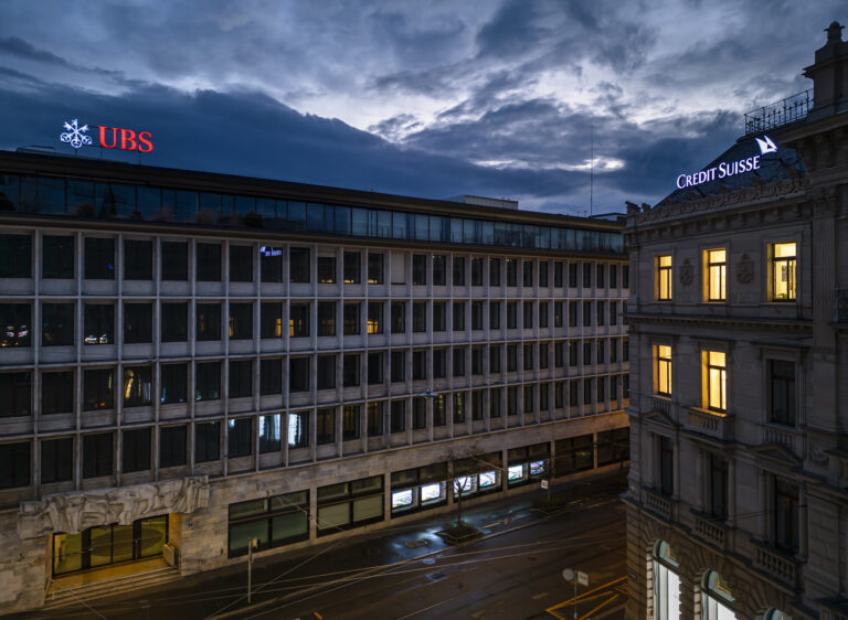 An aerial view shows the headquarters of the Swiss banks Credit Suisse, right, and UBS, left, at Paradeplatz in Zurich, Switzerland on Sunday March 19, 2023. (KEYSTONE/Michael Buholzer).