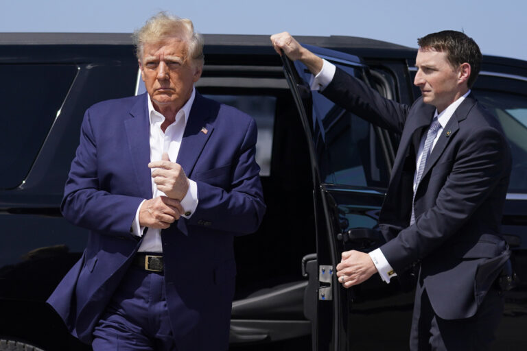 Former President Donald Trump arrives to board his airplane for a trip to a campaign rally in Waco, Texas, at West Palm Beach International Airport in West Palm Beach, Fla, Saturday, March 25, 2023. (AP Photo/Evan Vucci)