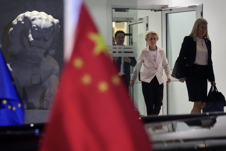 European Commission President Ursula von der Leyen leaves after attending a press conference at the Delegation of the European Union to China, in Beijing, Thursday, April 6, 2023. (AP Photo/Andy Wong)