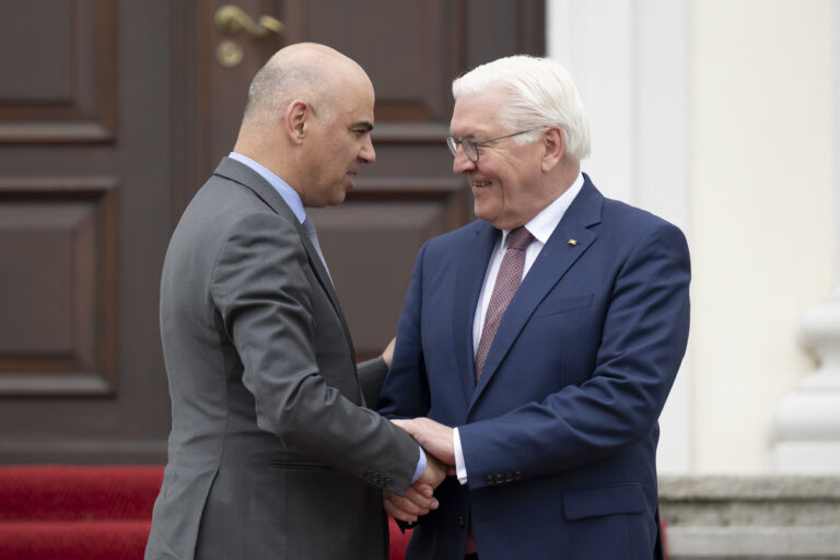 German President Frank-Walter Steinmeier, right, welcomes Swiss Federal President Alain Berset, left, during a work meeting at the Bellevue Palace, in Berlin, Germany, on Tuesday, April 18, 2023. (KEYSTONE/Anthony Anex)