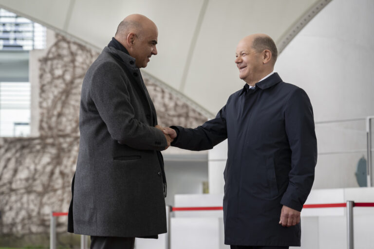 German Chancellor Olaf Scholz, right, welcomes Swiss Federal President Alain Berset,, left, prior to a work meeting at the Chancellery, in Berlin, Germany, on Tuesday, April 18, 2023. (KEYSTONE/Anthony Anex)