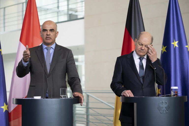 Swiss Federal President Alain Berset, left, speaks next to German Chancellor Olaf Scholz, right, during a media conference after a work meeting at the Chancellery, in Berlin, Germany, on Tuesday, April 18, 2023. (KEYSTONE/Anthony Anex)